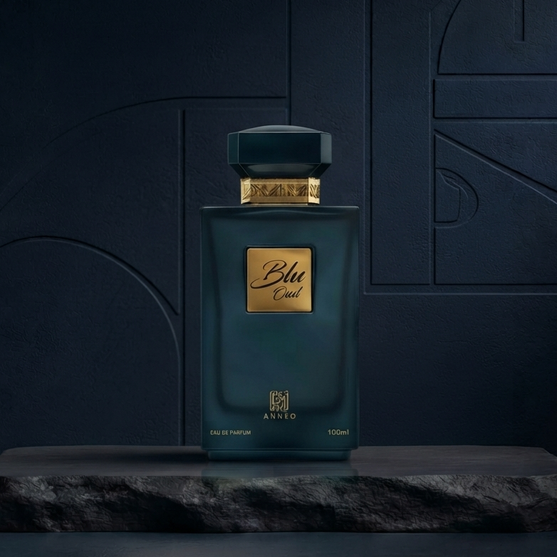 A dark teal rectangular perfume bottle with a gold label reading 'Blu Cloud' and 'ALYER' at the bottom, displayed on a dark stone slab against a dark navy textured background. SHE GLOW ✨