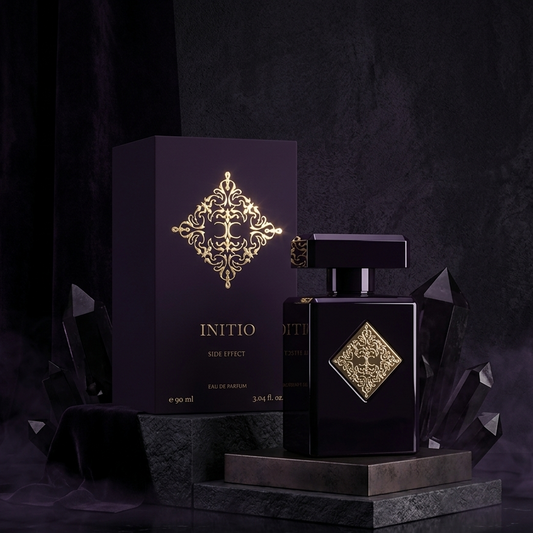 Black and gold Initio perfume bottle and packaging on a dark background