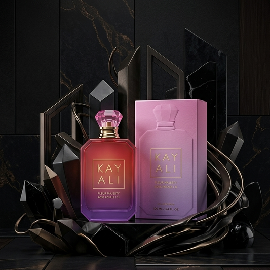 Two perfume bottles labeled 'KAY ALI' on a dark, decorative background.