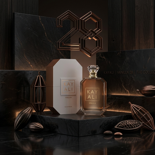 Kay Ali perfume bottle and packaging on a dark marble surface with decorative elements.