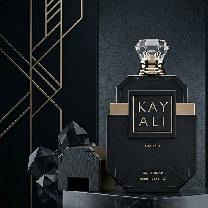 Black perfume bottle with crystal cap on a dark background, featuring the brand 'KAY ALI'.