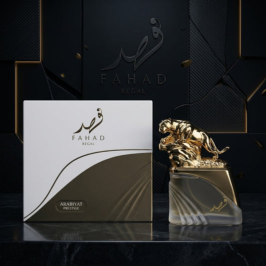 Fahad Regal Arabian perfume set featuring a white and gold outer box next to a clear glass bottle with a sculpted gold lion figurine on top, set against a dark textured background. SHE GLOW 