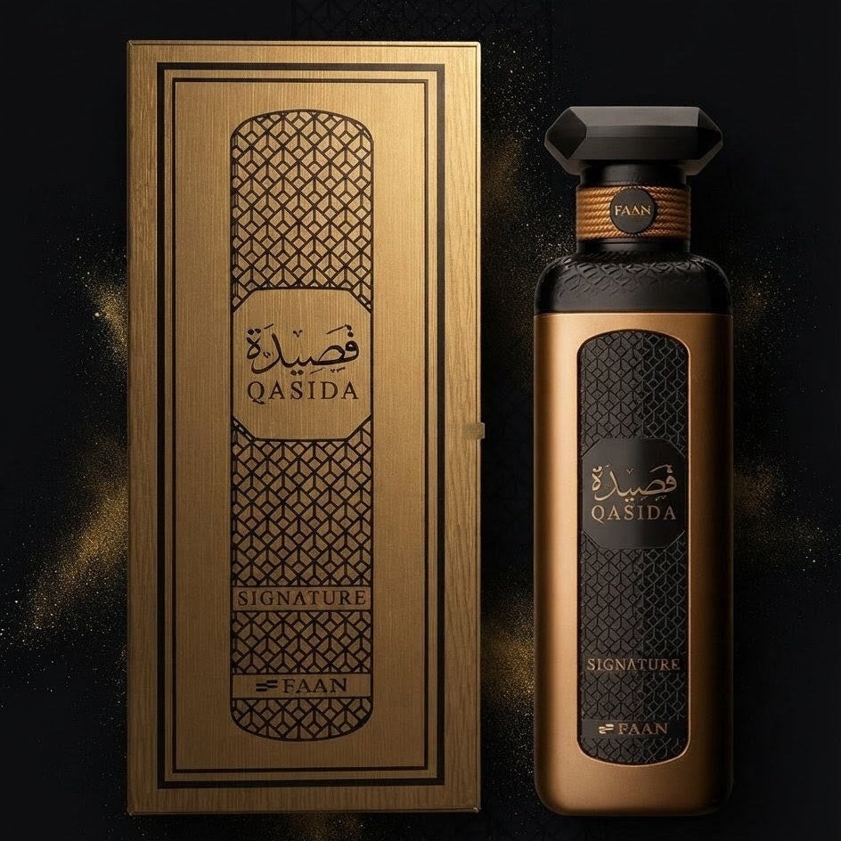 A luxury fragrance bottle and its matching rectangular box, both in metallic gold and black, featuring the brand name 'HAAN' and the product name 'QASIDA' in Arabic and English, set against a dark textured background. SHE GLOW ✨