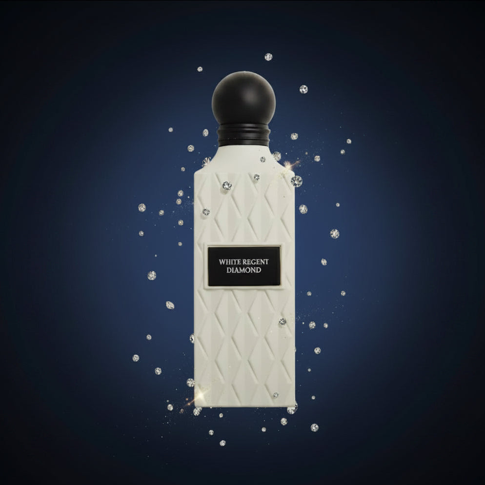 A luxury perfume bottle with a textured off-white body and a black spherical cap, labeled 'WHITE REGENT DIAMOND'.
 SHE GLOW ✨