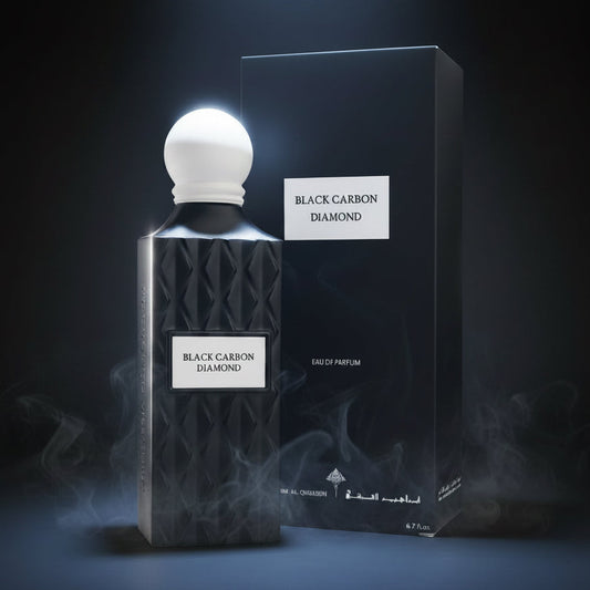 Black Carbon Diamond Eau de Parfum bottle with a textured black body and white spherical cap, shown next to its black packaging box with a white label. SHE GLOW ✨