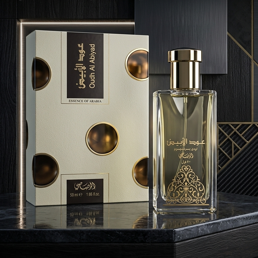 Perfume bottle and packaging with Arabic text on a dark background