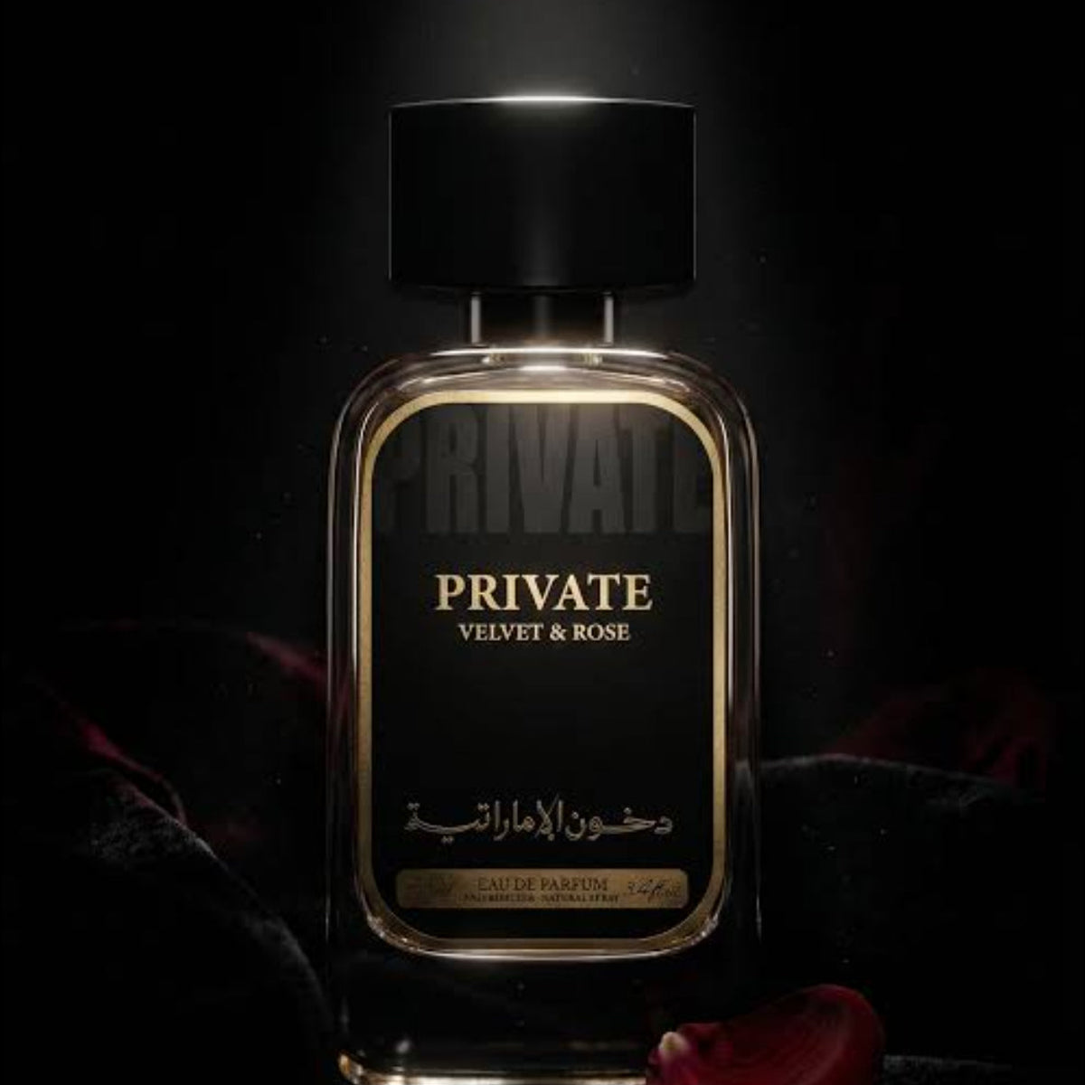 A luxury perfume bottle labeled 'PRIVATE VELVET & ROSE' in gold lettering on a black label, set against a dark, moody background with a single red rose petal in the foreground. SHE GLOW ✨